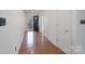 Open entryway with beautiful wood floors and a view to the front door at 1963 Wexford Ct, Gastonia, NC 28054