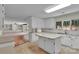 Kitchen and Living room with bright cabinetry, lots of counter space, and backyard access at 1963 Wexford Ct, Gastonia, NC 28054
