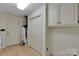 This laundry room features a water heater, storage, and access to the backyard, perfect for convenience at 1963 Wexford Ct, Gastonia, NC 28054