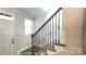 Staircase features dark wood railings and white risers at 19724-B School St, Cornelius, NC 28031