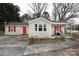 Charming single-story home with a cozy front porch, red shutters, and a well-maintained yard at 2010 Simmons St, Gaston, NC 28052