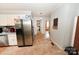 Functional kitchen with stainless steel refrigerator and ample countertop space at 2010 Simmons St, Gaston, NC 28052