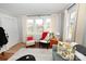 Cozy living room with natural light from windows and comfortable seating arrangement at 2010 Simmons St, Gaston, NC 28052