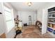 Brightly lit room with visible tools, work station, and items strewn on the floor at 2010 Simmons St, Gaston, NC 28052