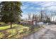 Exterior shot of a fenced in brick home with a well-maintained yard and driveway at 213 Turner Rd, Gastonia, NC 28056