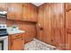 Well-organized kitchen with wood cabinets, stainless steel appliances, and efficient layout at 213 Turner Rd, Gastonia, NC 28056