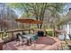 The outdoor deck is perfect for grilling and has outdoor seating for entertaining with natural landscape views at 230 Valley View Dr, Clover, SC 29710