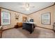 Cozy home office with neutral walls, trim, carpet and a ceiling fan for a peaceful workspace at 230 Valley View Dr, Clover, SC 29710