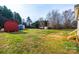 Large backyard with multiple sheds, ideal for storage or workshop, offering great outdoor space at 2561 Ellys St, Lincolnton, NC 28092