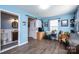 Stylish living room with blue walls, wood-look floors, and a convenient half bath at 2561 Ellys St, Lincolnton, NC 28092