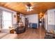 Bright living room with a ceiling fan, hardwood floors, and natural light at 2561 Ellys St, Lincolnton, NC 28092