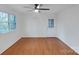 Bedroom featuring wood floors, ceiling fan, and access to a backyard at 2750 Morgan Rd, Gold Hill, NC 28071