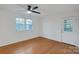 Bedroom featuring wood floors, ceiling fan, and windows to the outside at 2750 Morgan Rd, Gold Hill, NC 28071