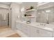 Modern bathroom with dual sinks, plenty of counter space, and sleek white cabinetry at 2924 Springs Dr, Charlotte, NC 28226