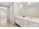 Bright bathroom featuring a double vanity, large mirror and modern fixtures at 2924 Springs Dr, Charlotte, NC 28226