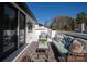 An outdoor patio featuring a sofa, chairs, table, and stylish rug with access to interior of home at 2924 Springs Dr, Charlotte, NC 28226