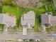 An aerial view shows a home's backyard, deck, patio, and landscaping within a neighborhood at 3203 Thayer Dr, Waxhaw, NC 28173