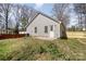 The backyard features a small concrete patio and leads to a fenced-in yard at 329 Gurley Nw Dr, Concord, NC 28027