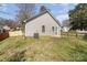 The property features a small patio and fenced-in yard at 329 Gurley Nw Dr, Concord, NC 28027