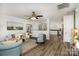 Bright living room with hardwood floors, modern furniture, and an open layout at 329 Gurley Nw Dr, Concord, NC 28027