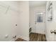 Mud room with coat rack, shelving, and tile floor at 329 Gurley Nw Dr, Concord, NC 28027