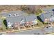 Aerial shot of townhomes along the street, showcasing landscaping and community design at 4221 Coulter Xing, Charlotte, NC 28213