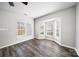 Sun-filled room featuring a bay window, wood-look floors and neutral paint at 4221 Coulter Xing, Charlotte, NC 28213