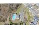 Aerial view of a community pool with ample parking and proximity to neighboring homes at 4221 Coulter Xing, Charlotte, NC 28213