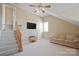 Versatile bonus room with vaulted ceilings, neutral carpet, and staircase, ready for various uses at 4300 Pointe Norman Dr, Sherrills Ford, NC 28673