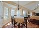 Inviting breakfast nook with large windows, offering bright and sunny atmosphere for dining at 4300 Pointe Norman Dr, Sherrills Ford, NC 28673