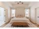 Cozy bedroom with neutral tones, tray ceiling, and hardwood floors at 4412 Holly Ne Cir, Conover, NC 28613