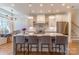 Modern kitchen with an eat-in island, marble countertops, and stainless steel appliances at 4412 Holly Ne Cir, Conover, NC 28613