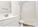 This bathroom features a vanity sink, toilet, and shower-tub combo at 4513 Staffordshire Ln, Charlotte, NC 28213