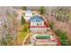 Aerial view showcasing a home, detached garage, pool, and fire pit at 4846 Midway Sand Rd, Hickory, NC 28601