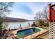 Backyard featuring a swimming pool and lake views at 4846 Midway Sand Rd, Hickory, NC 28601