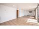 Finished basement with tiled floor, recessed lighting, and white walls, creating a clean and versatile space at 4846 Midway Sand Rd, Hickory, NC 28601