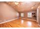 Bedroom features hardwood floors, wood ceiling, two windows, and neutral-colored walls at 4846 Midway Sand Rd, Hickory, NC 28601