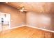 Bedroom features hardwood floors, wood ceiling, and neutral-colored walls, looking towards the kitchen at 4846 Midway Sand Rd, Hickory, NC 28601