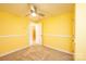 Bedroom with light colored walls and carpet, ceiling fan, closet and entryway at 4846 Midway Sand Rd, Hickory, NC 28601