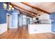 Open kitchen featuring white cabinets, stainless steel appliances and hardwood floors at 4846 Midway Sand Rd, Hickory, NC 28601