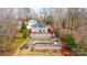 Rear exterior view of home, deck, pool, fireplace and outdoor living space at 4846 Midway Sand Rd, Hickory, NC 28601