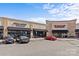 Commercial buildings with varied storefronts featuring awnings, ample parking, and well-maintained exteriors for various dining at 5140 Old Monroe Rd, Indian Trail, NC 28079