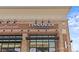 Cinnaholic storefront displaying brick facade, clear signage, and modern lighting under a bright blue sky at 5140 Old Monroe Rd, Indian Trail, NC 28079