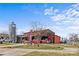 The exterior of the fresh market with a silo on a clear day featuring a picnic table at 5140 Old Monroe Rd, Indian Trail, NC 28079