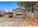 Garage with a large door and covered patio area on the side at 5140 Old Monroe Rd, Indian Trail, NC 28079