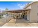 View of the covered patio area with seating near the above-ground pool at 5140 Old Monroe Rd, Indian Trail, NC 28079