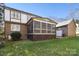 Expansive backyard with a screened-in porch addition on a sunny day is perfect for outdoor living at 5217 Camilla Dr, Charlotte, NC 28226