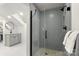 Modern bathroom features a stylish shower with gray subway tile and skylight above sink area at 5217 Camilla Dr, Charlotte, NC 28226