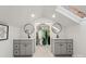 Bright bathroom with skylight, double vanity and modern sinks at 5217 Camilla Dr, Charlotte, NC 28226