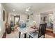 Bright living room showcases built-in shelving and cozy seating area near the entry way at 5217 Camilla Dr, Charlotte, NC 28226